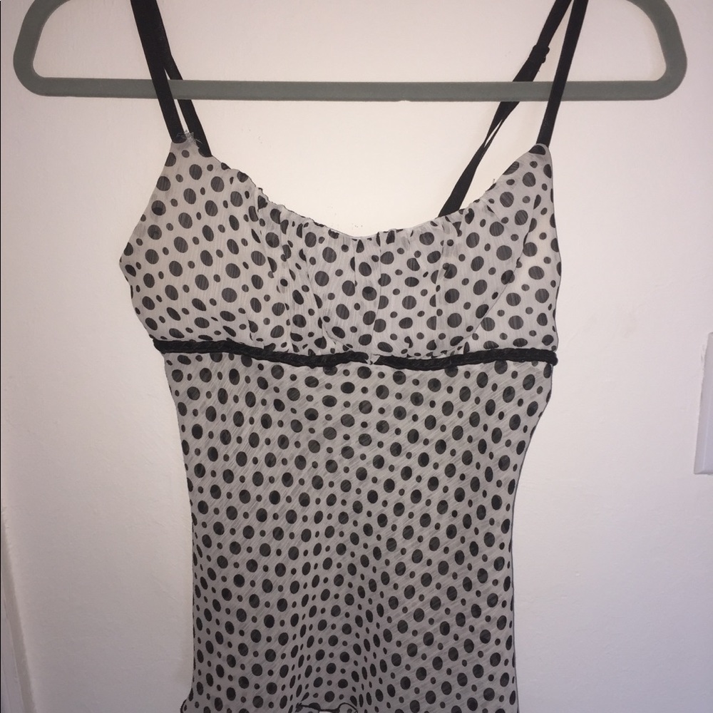 White with black polka dots sheer shirt.